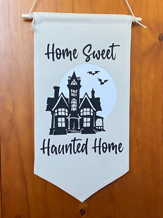 Home sweet haunted home wall flag