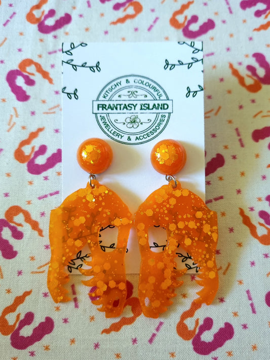 Orange Glitter T-Rex Skull Earrings